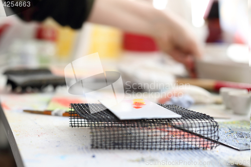 Image of Painting on glass. Painting tiles.