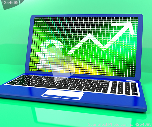 Image of Pound Sign And Up Arrow On Laptop For Earnings Or Profit