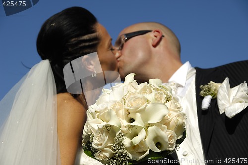 Image of Wedding couple kissing