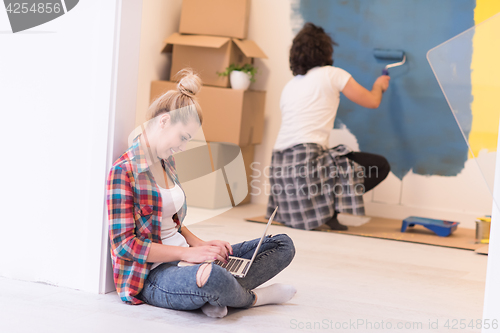 Image of Happy couple doing home renovations