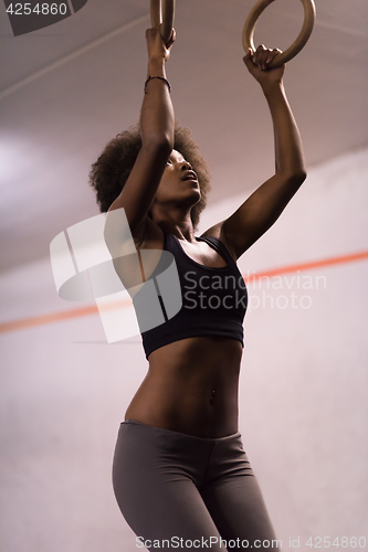 Image of black woman doing dipping exercise
