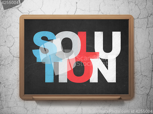 Image of Business concept: Solution on School board background