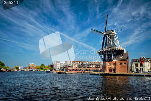 Image of Harlem landmark windmill De Adriaan on Spaarne river. Harlem,