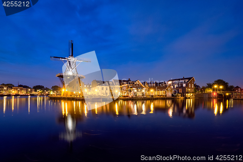 Image of Harlem landmark windmill De Adriaan on Spaarne river. Harlem,