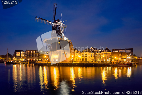 Image of Harlem landmark windmill De Adriaan on Spaarne river. Harlem,