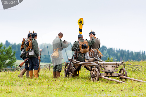 Image of German soldiers of the first world war near border pillar.