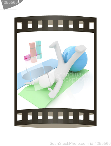 Image of 3d man on a karemat with fitness ball. 3D illustration. The film