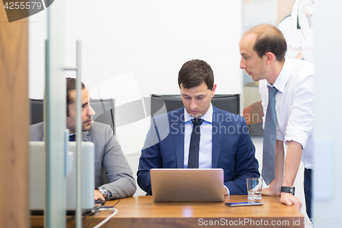 Image of Corporate businessteam working in modern office.