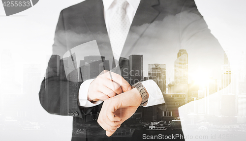 Image of close up of businessman with wristwatch