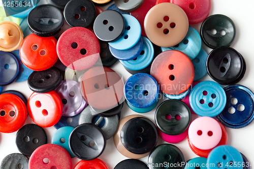 Image of close up of sewing buttons