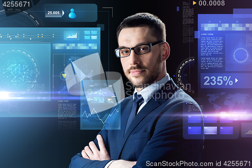 Image of businessman in glasses over black