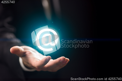 Image of Man\'s hand holds internet sign