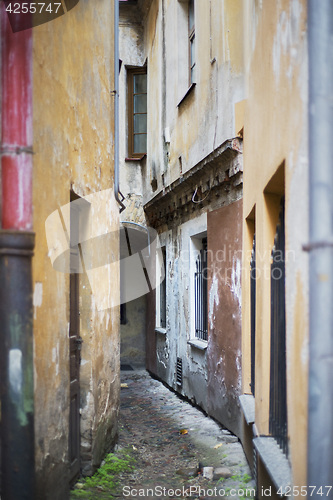 Image of very narrow and dirty alley in the old town