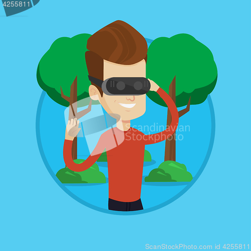 Image of Man wearing virtual reality headset in the park.