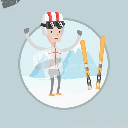 Image of Cheerful skier standing with raised hands.