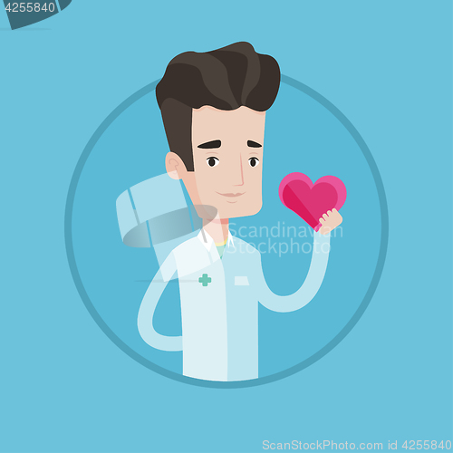 Image of Doctor cardiologist holding heart.