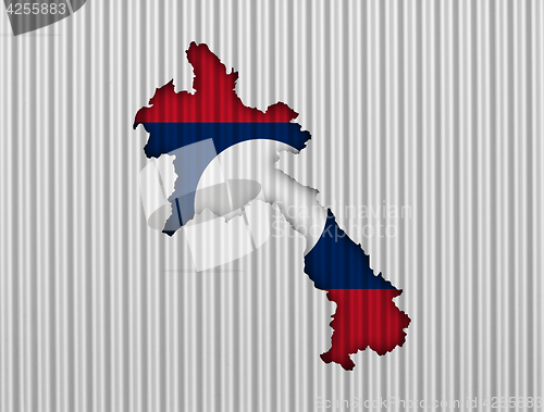 Image of Map and flag of Laos on corrugated iron