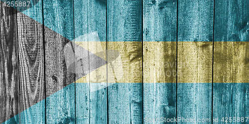 Image of Flag of Bahamas on weathered wood