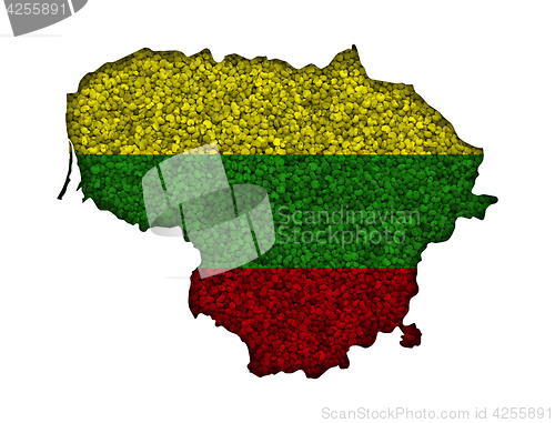 Image of Map and flag of Lithuania on poppy seeds