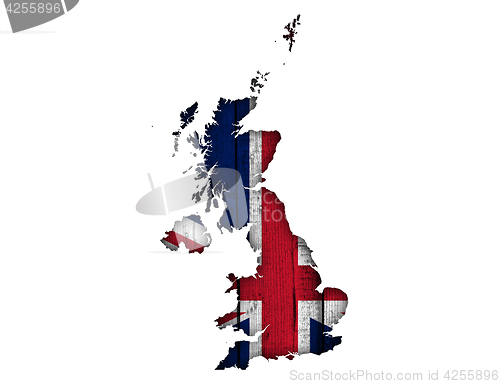 Image of Map and flag of Great Britain on wood,