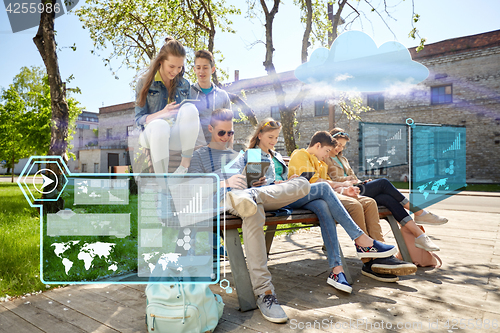 Image of group of students with tablet pc at school yard