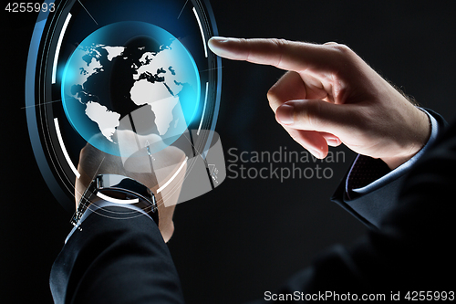 Image of close up of businessman hands with smartwatch
