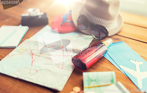 Image of close up of travel map, tickets, money and stuff