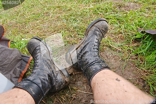 Image of Worn Muddy Boots