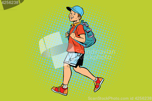 Image of Boy student with a backpack goes to school or Hiking