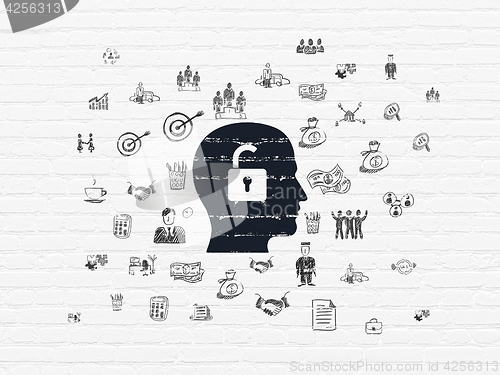 Image of Finance concept: Head With Padlock on wall background