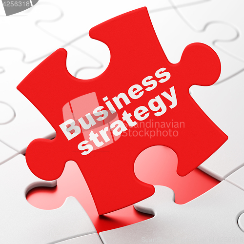 Image of Business concept: Business Strategy on puzzle background