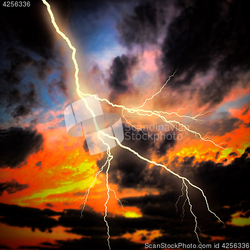 Image of Night cityscape with strong lightning