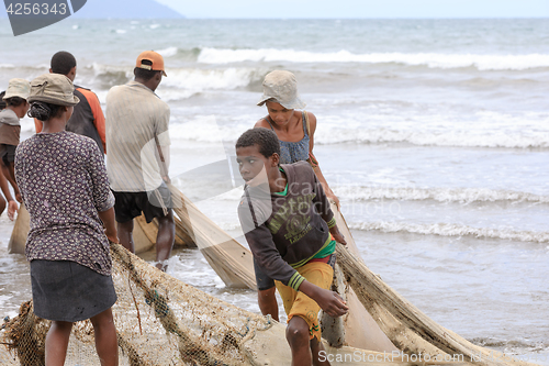 Image of Native Malagasy fishermen fishing on sea, Madagascar