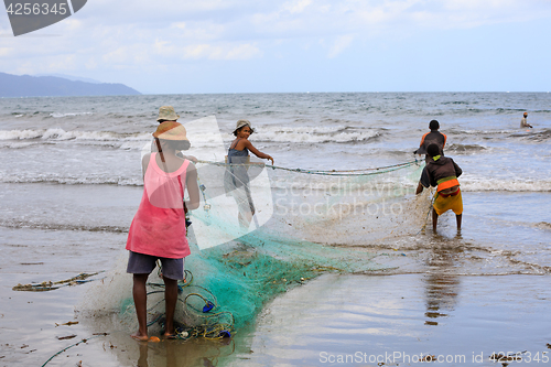 Image of Native Malagasy fishermen fishing on sea, Madagascar