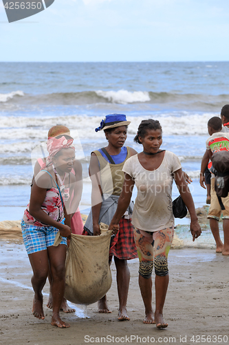 Image of Native Malagasy fishermen fishing on sea, Madagascar