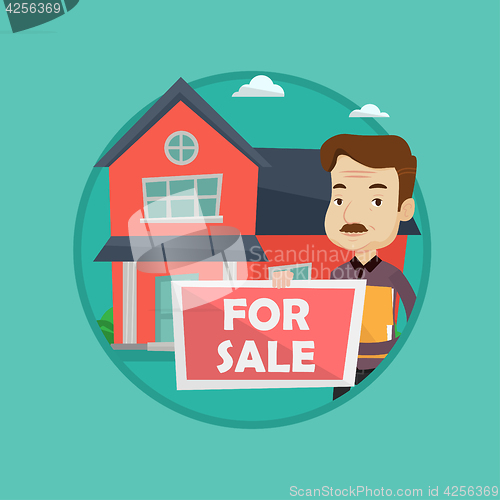 Image of Real estate agent offering house.