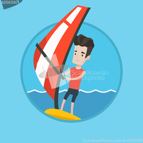 Image of Young man windsurfing in the sea.