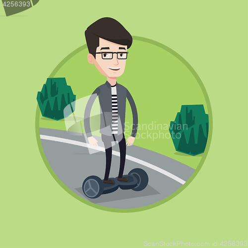 Image of Man riding on self-balancing electric scooter.