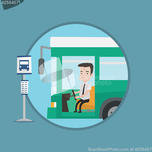 Image of Caucasian bus driver sitting at steering wheel.