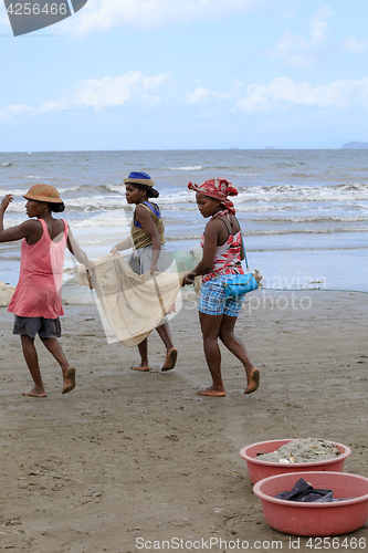 Image of Native Malagasy fishermen fishing on sea, Madagascar