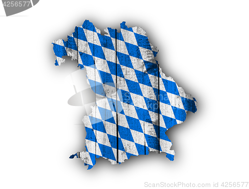 Image of Map and flag of Bavaria on weathered wood