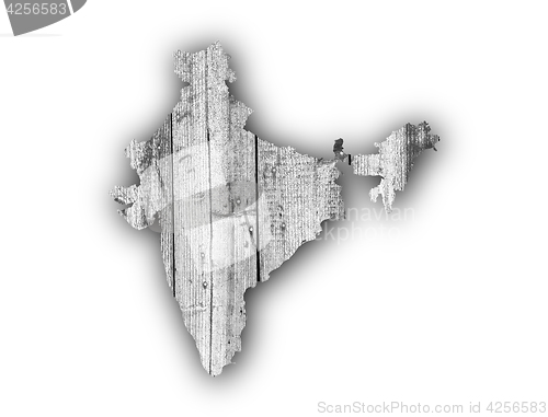 Image of Map of India on weathered wood