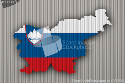 Image of Map and flag of Slovenia on corrugated iron