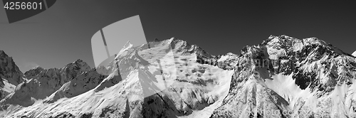 Image of Black and white panorama of snow mountains.