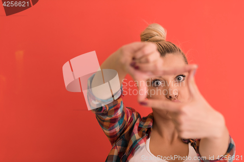 Image of young woman over color background