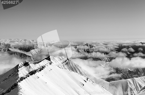 Image of Black and white view on high winter mountains in haze