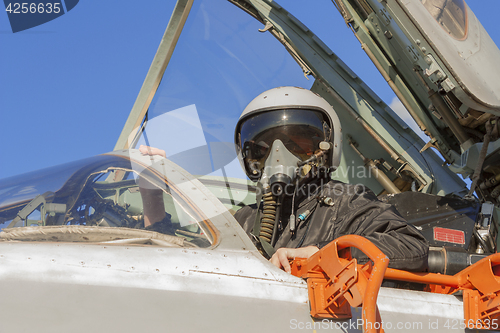 Image of Military pilot in the cockpit of a jet aircraft