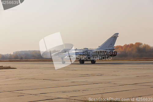 Image of Military jet bomber Su-24 Fencer afterburner takeoff