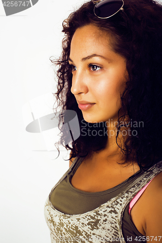 Image of young happy smiling latin american teenage girl emotional posing on white background, lifestyle people concept 