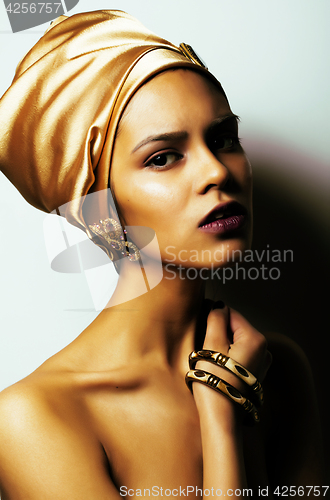 Image of beauty african woman in shawl on head, very elegant look with go